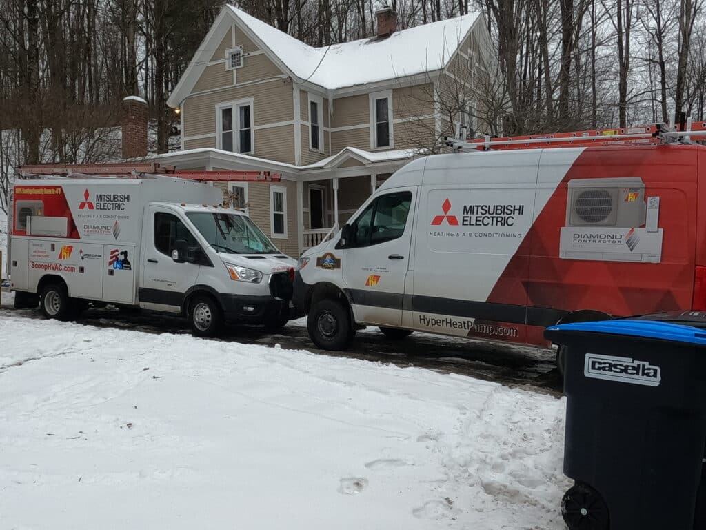Superior CO-OP HVAC service van at a snowy Upstate NY home