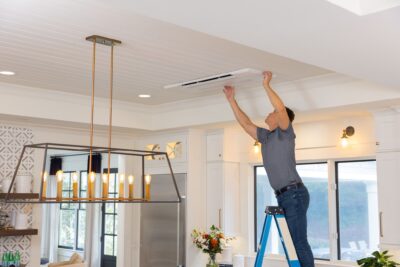 Certified Mitsubishi heat pump installer at work