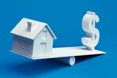 House balanced with money illustrating financing